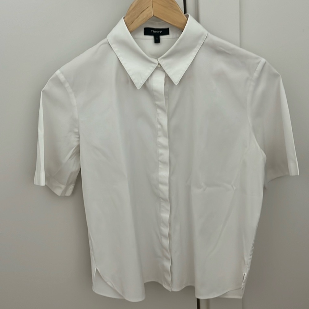 White button-down shirt.